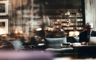 Should businesses hire professionals for trademark monitoring, or can they take a DIY approach?