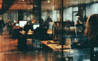 What is the importance of reviewing monitoring reports and analyzing alerts for trademark conflicts?
